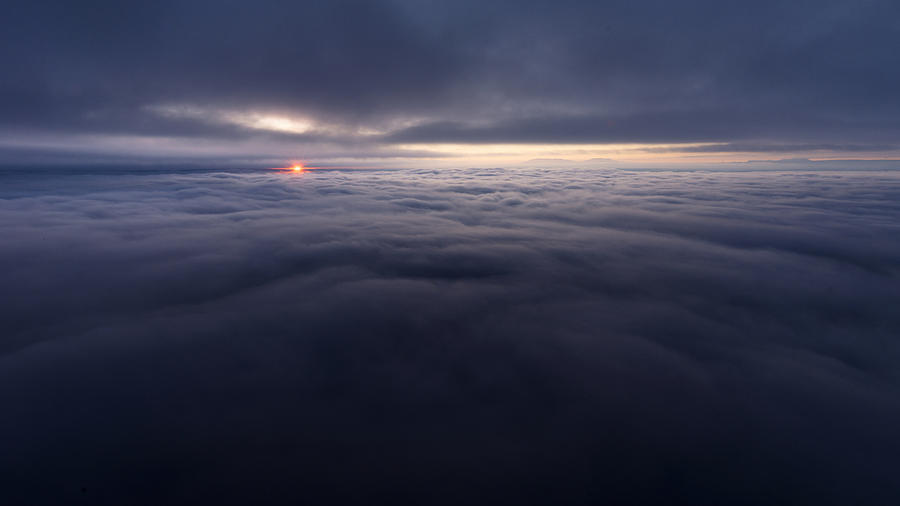 Sunset Photograph - Between the Clouds by Dustin LeFevre