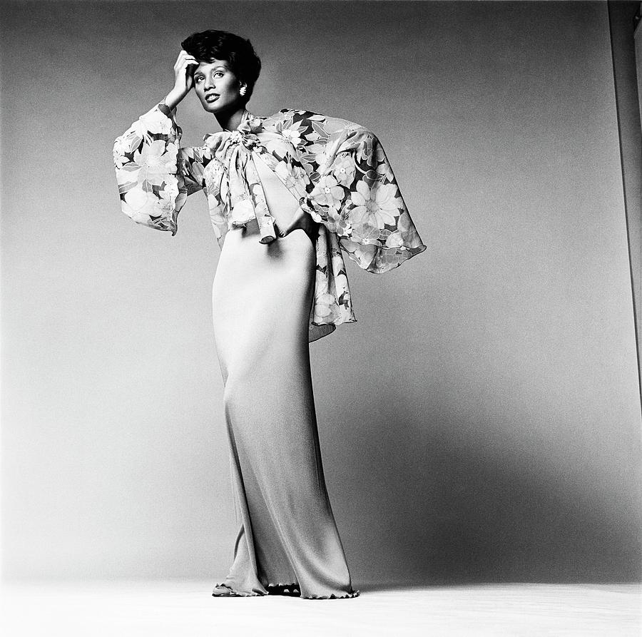 Beverly Johnson Wearing A Dress And Chiffon Photograph by Francesco Scavullo