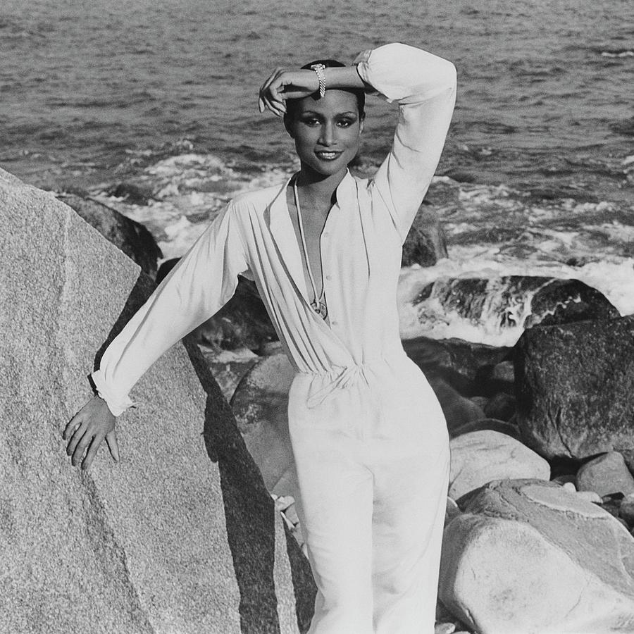 Black And White Photograph - Beverly Johnson Wearing A Jumpsuit by Francesco Scavullo