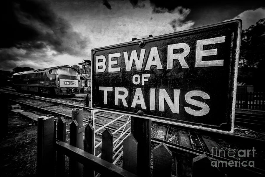 Black And White Photograph - Beware of Trains by Adrian Evans