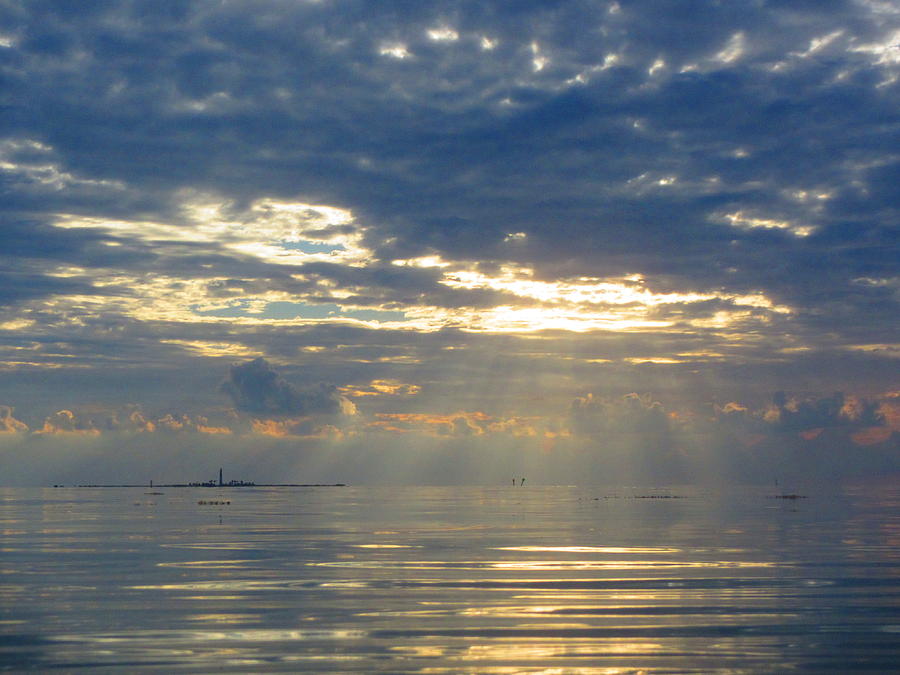 Sunset Photograph - Beyond the Lighthouse lie many a Soul by Capt  Pat  Moran