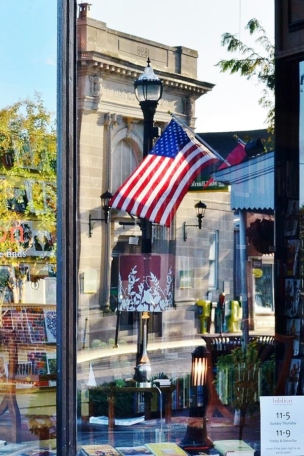 Flag Photograph - Biblion Used Books Reflections 2 - Lewes Delaware by Kim Bemis