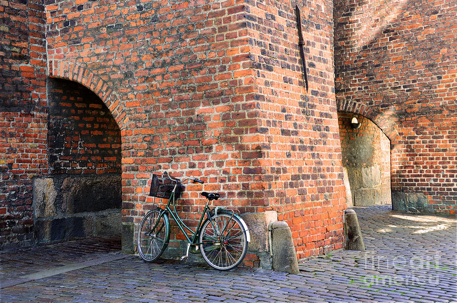 Bicycle at St. Nicholas Church in Copenhagen Photograph by Catherine Sherman