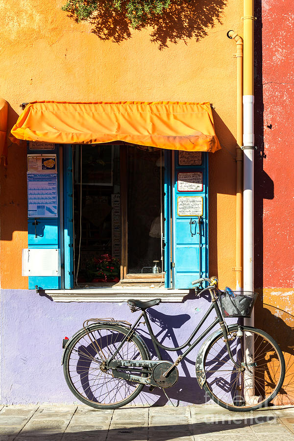 Bicycle in front of colorful house - Burano - Venice Photograph by Matteo Colombo