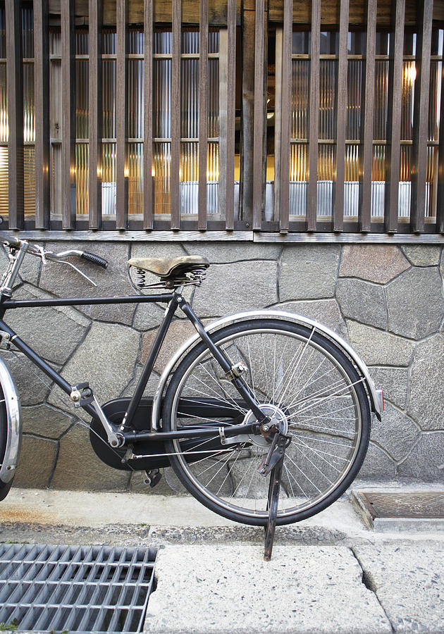 Bicycle Parked on the Pavement, Japan Photograph by Jeremy Maude