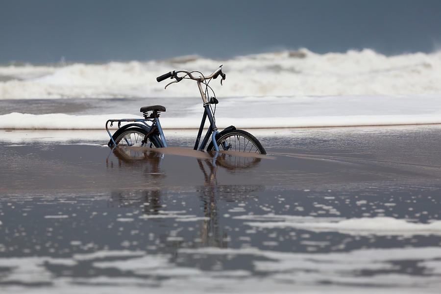 Bicycle Stuck In Sand On A Beach Photograph by Rob Kints