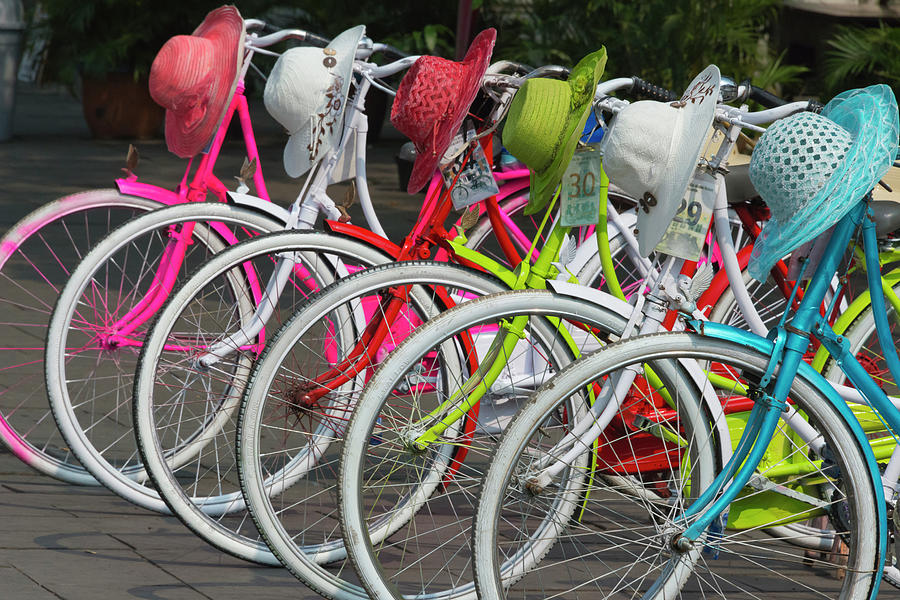 Bicycle Photograph - Bicycles And Colorful Straw Hats by Keren Su
