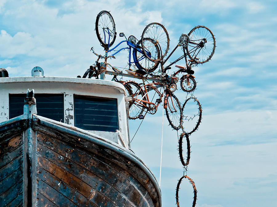 Bicycles Falling off a Boat Photograph by Ronda Broatch