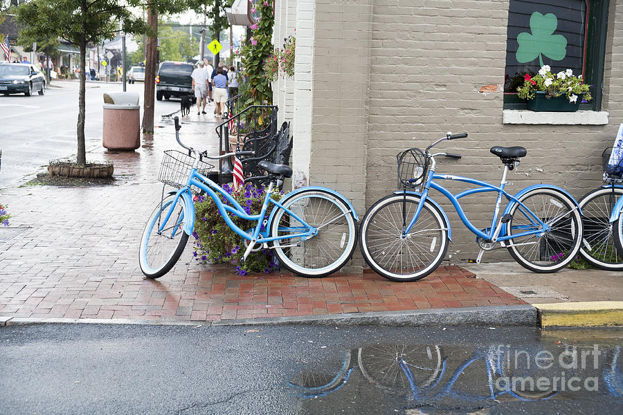 Bicycles parked along the main street in Saint Michaels Maryland. Photograph by William Kuta