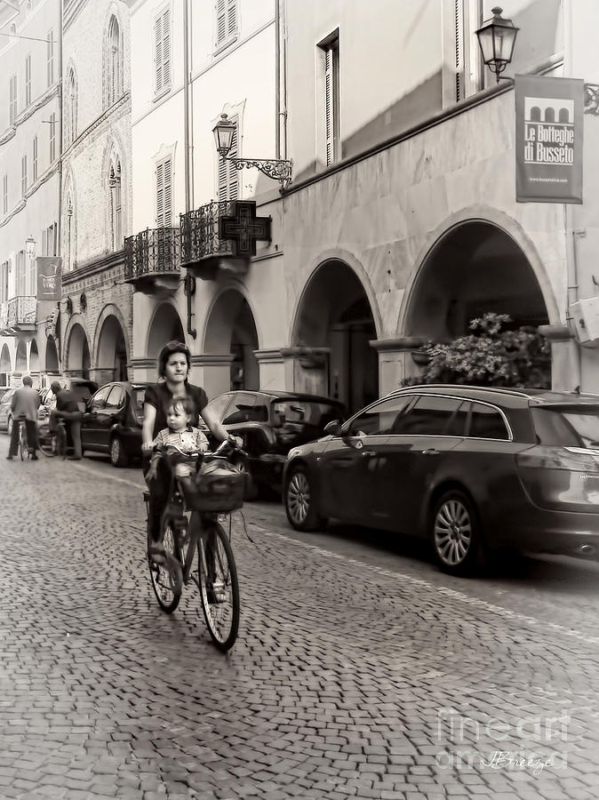 Bicycling in Busseto.Italy Photograph by Jennie Breeze