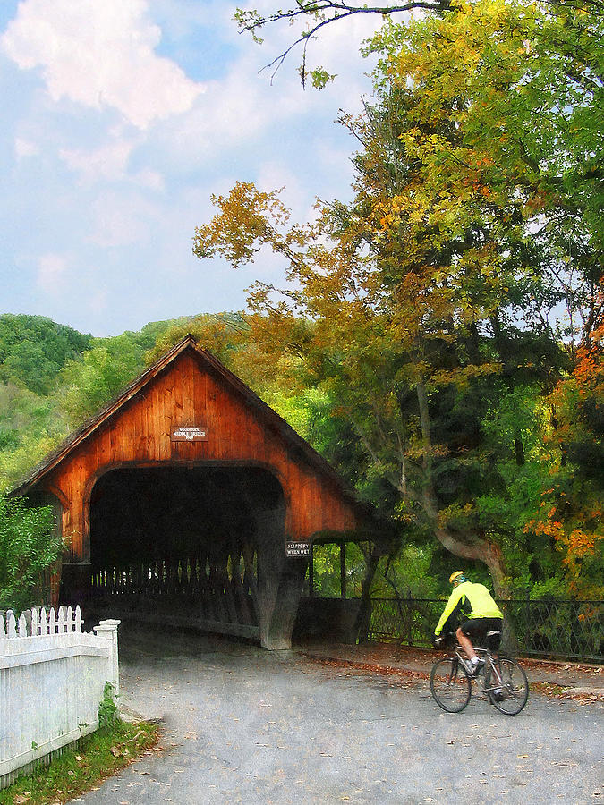 Bicyclist at Middle Bridge Woodstock VT Photograph by Susan Savad