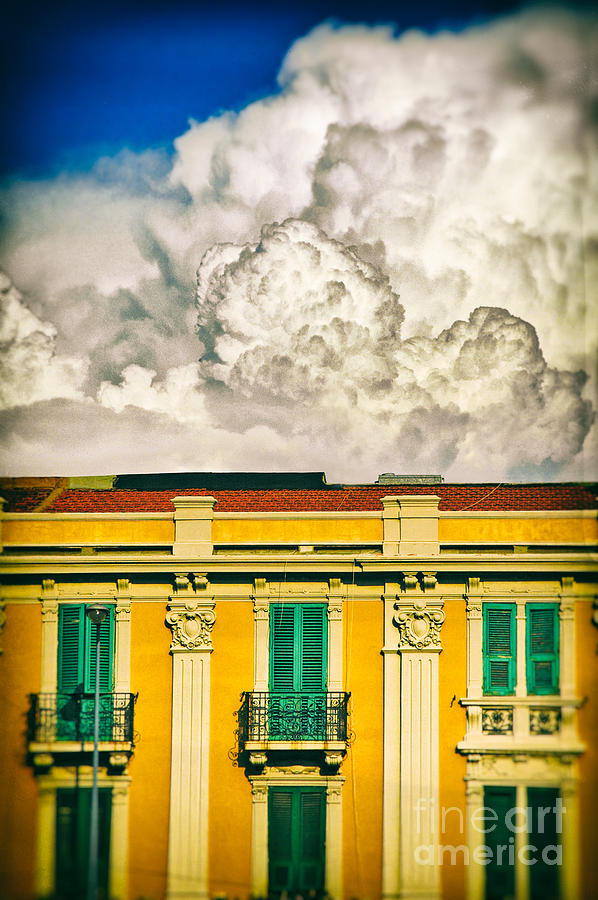 Big cloud over city building Photograph by Silvia Ganora