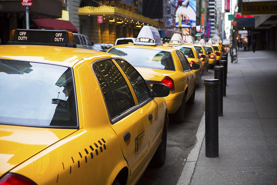 Big Line of Yellow Taxis in New York City Photograph by Quavondo