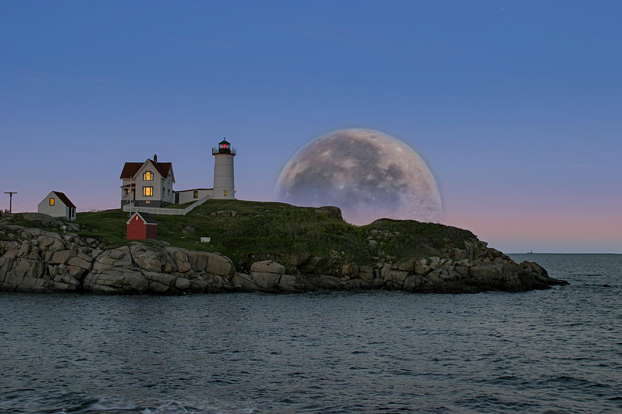 Big moon over Nubble Lighthouse Photograph by Jeff Folger