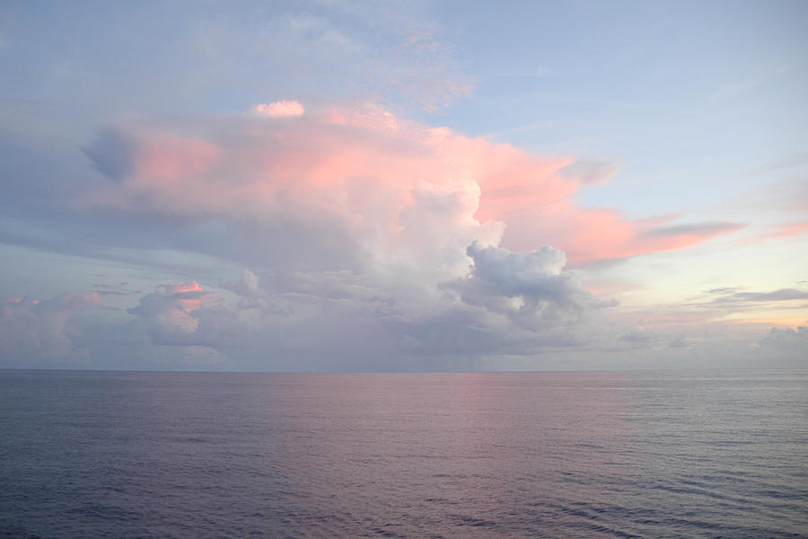 Big pink cloud over sea Photograph by Bradford Martin