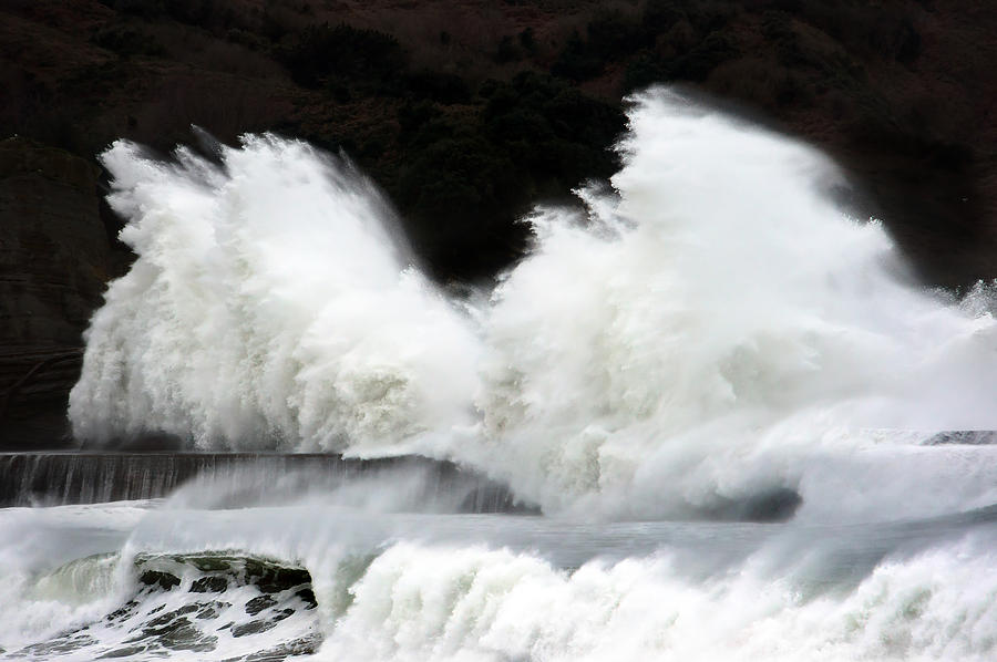 Big Waves Breaking On Breakwater Photograph by Mikel Martinez de Osaba