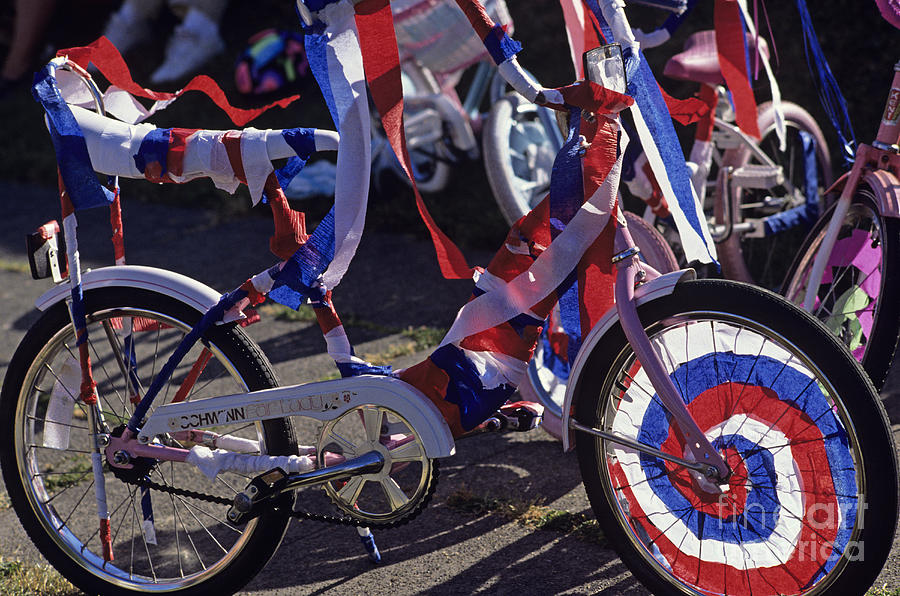 Bike covered with Red White and Blue streamers Photograph by Jim Corwin
