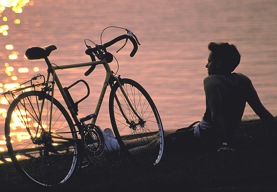 Biker Relaxes On Banks Of Potomac Photograph