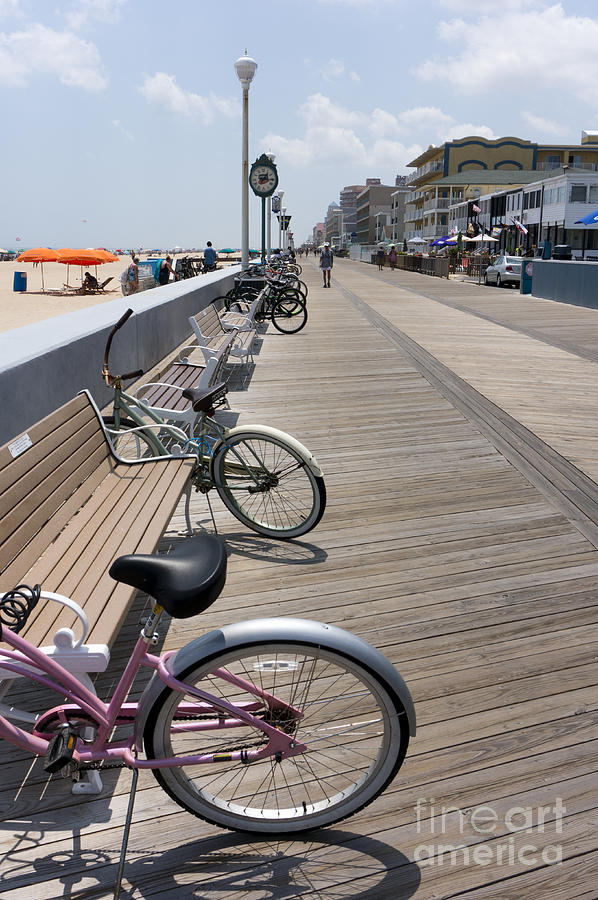 Bikes parked on the boardwalk in Ocean City Maryland. Photograph by William Kuta