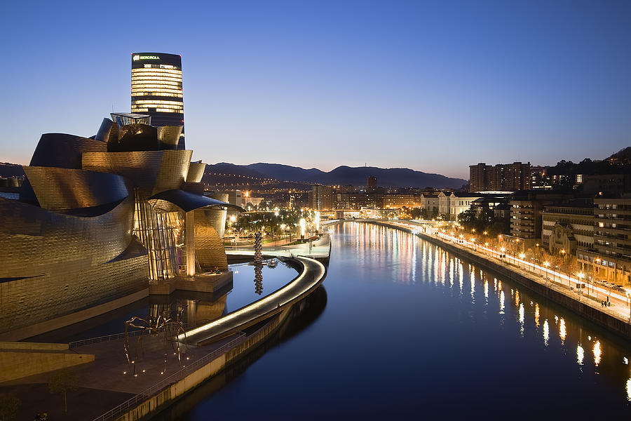 Spider Photograph - Bilbao at Night by Michael Hobsters