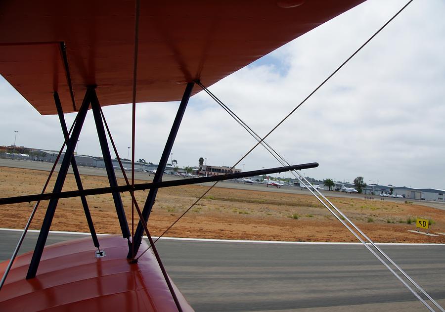 Biplane Taxying Back To Tie Down Photograph by Phyllis Spoor