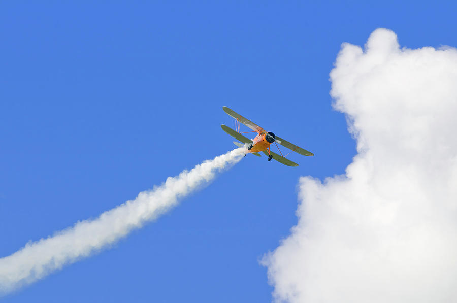 Biplane With A Vapour Trail, Blue Sky Photograph by Zu 09