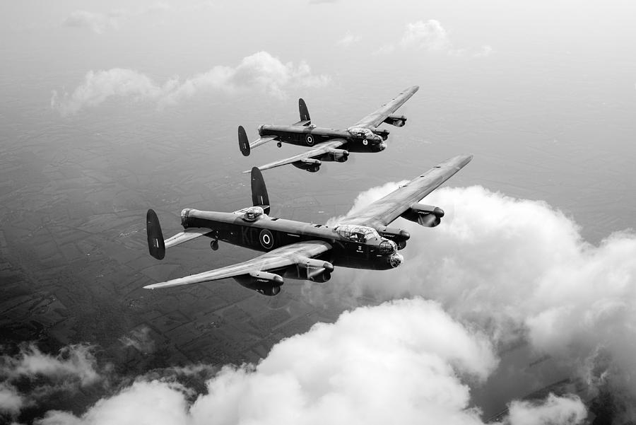 Birds of a feather - Two Lancasters - black and white version Photograph by Gary Eason