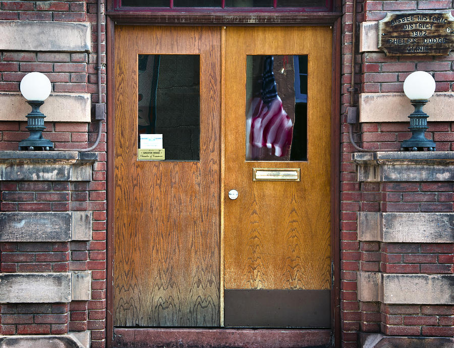 Brick Photograph - Historic Bisbee Building and American Flag by Dave Dilli