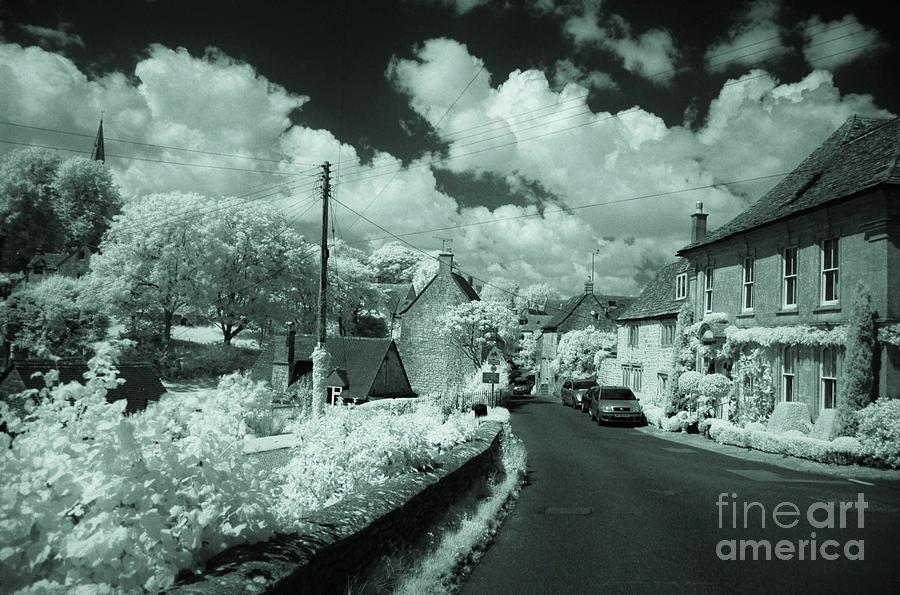 Summer Photograph - Bisley a Cotswold village as seen through an infrared lens by C Lythgo