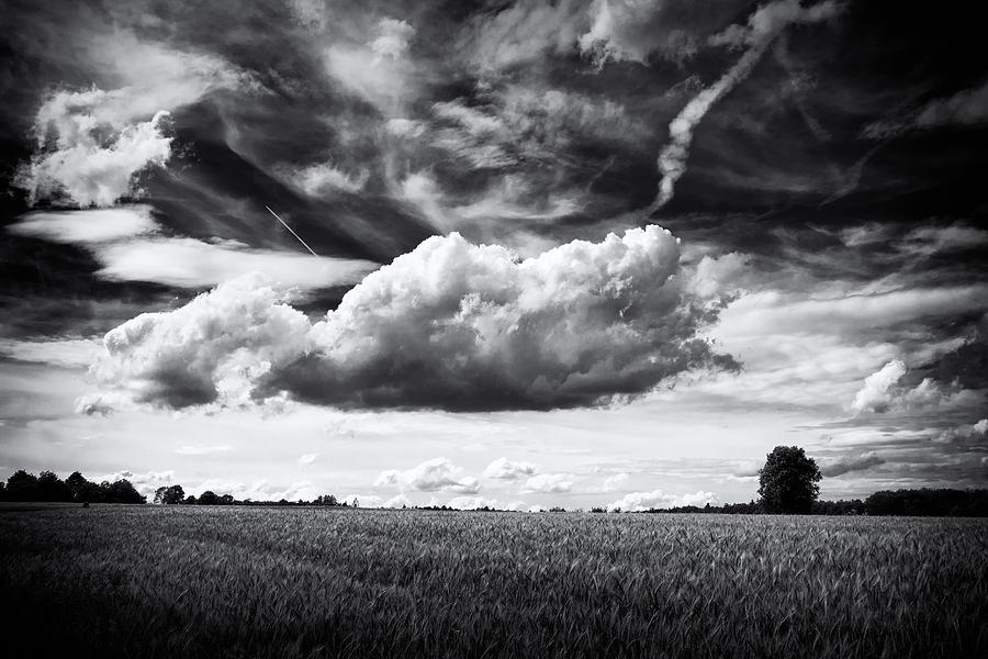 Black and white landscape with dramatic sky and clouds Photograph by Matthias Hauser