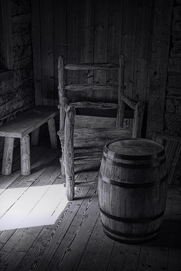 Vintage Photograph - Black and White Photograph of light coming through a doorway with Wooden chair and keg by Randall Nyhof