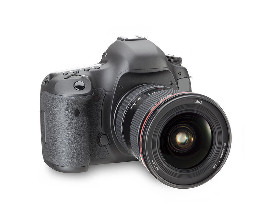 Black digital SLR camera in a white background Photograph by Studiocasper