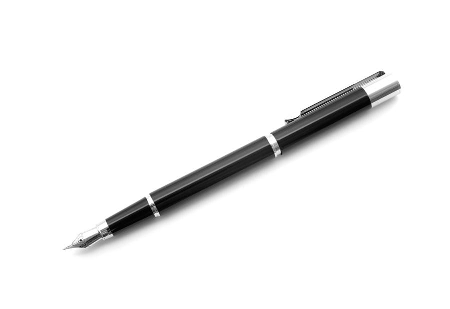 Black fountain pen on white background Photograph by Deepblue4you