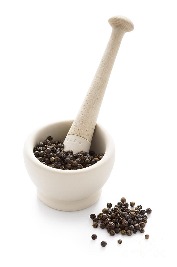 Black Peppercorns In A White Pestle And Mortar Photograph by Lee Avison