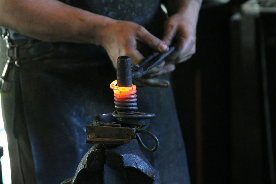 Blacksmith At Work Photograph by Jackson Pearson