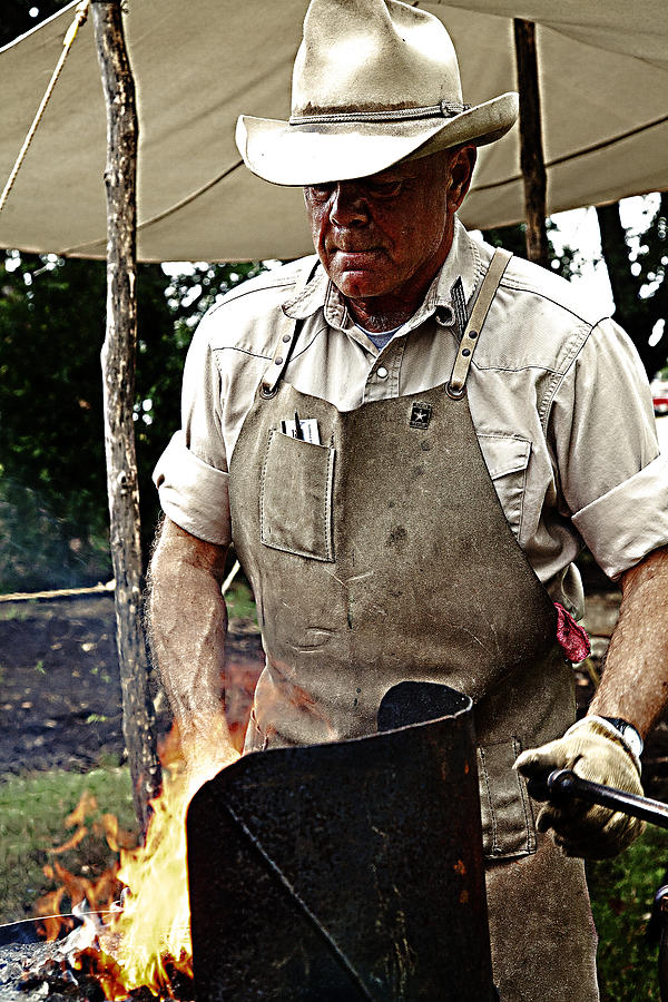 Blacksmith at work Photograph by Toni Hopper
