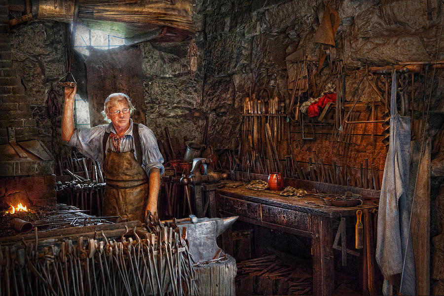 Vintage Photograph - Blacksmith - Working the forge  by Mike Savad