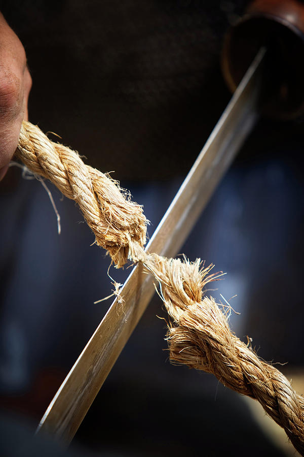 Blade Cutting Rope Photograph by Ron Koeberer - Pixels