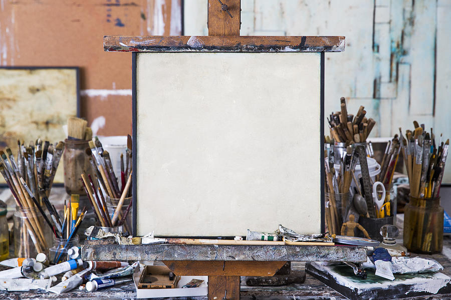 Blank art canvas in mess artists studio Photograph by Dimitri Otis