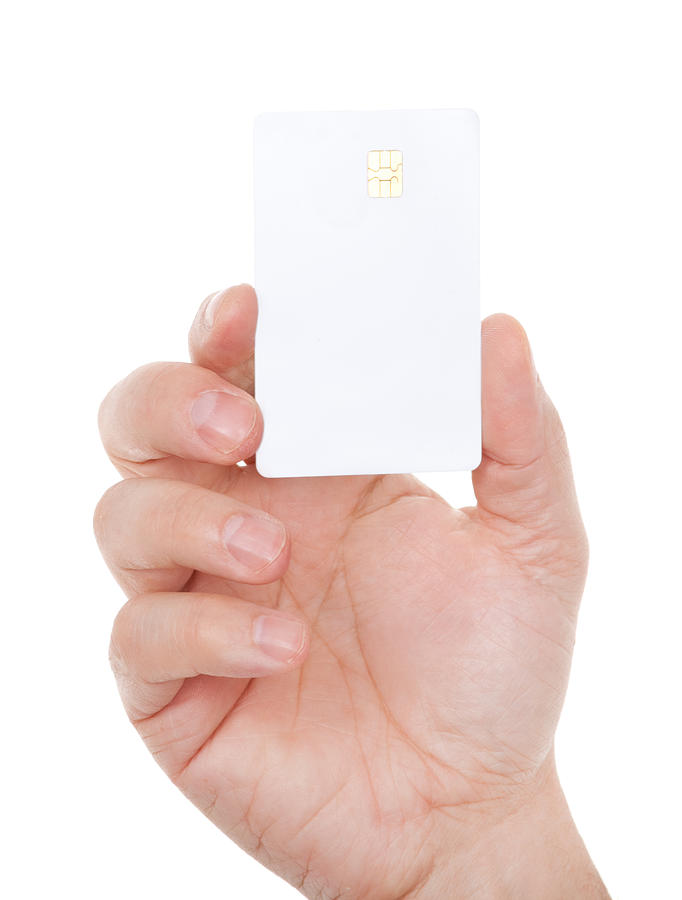 Blank card in male hand on white Photograph by Deepblue4you