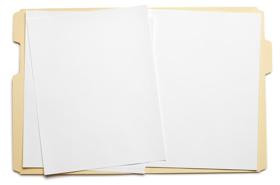 Blank paper in an open file folder on white background Photograph by Dny59