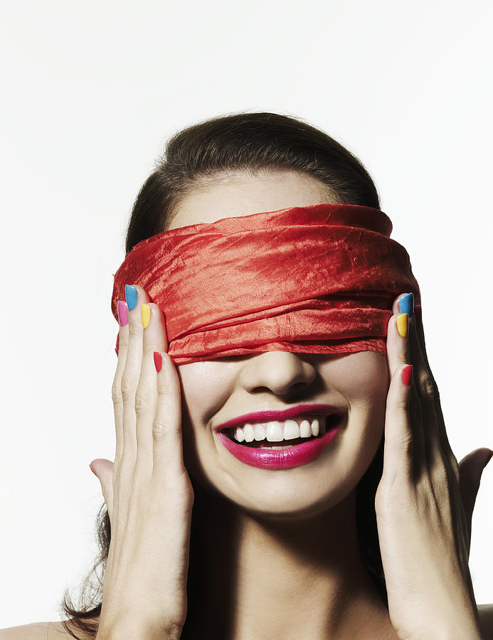 Blindfolded girl with bright nail polish Photograph by Elizabeth Hachem