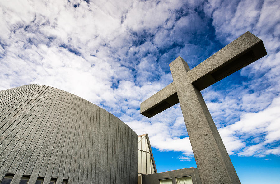 Bloenduos church with cross Iceland Photograph by Matthias Hauser