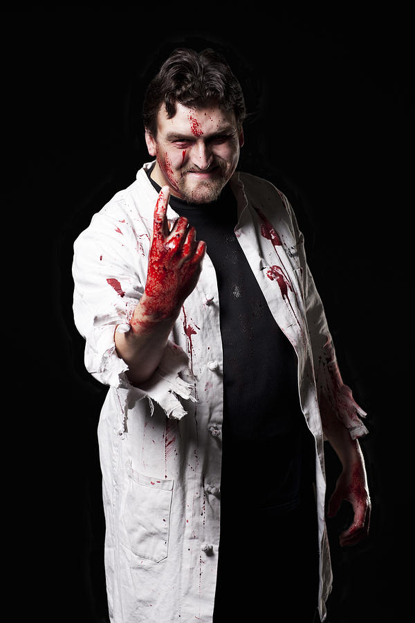 Bloody Doctor Halloween Costume Portrait on Black, Copy Space Photograph by Quavondo
