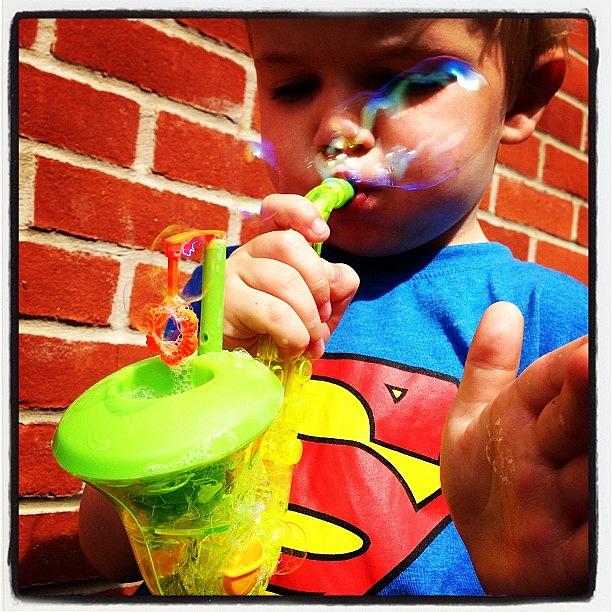 Superman Photograph - Blowing Bubbles #ashton #nephew by Samantha Charity Hall