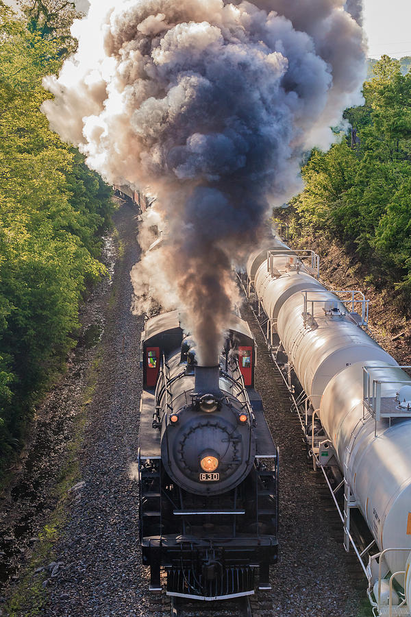 Blowing Smoke Photograph by Keith Allen