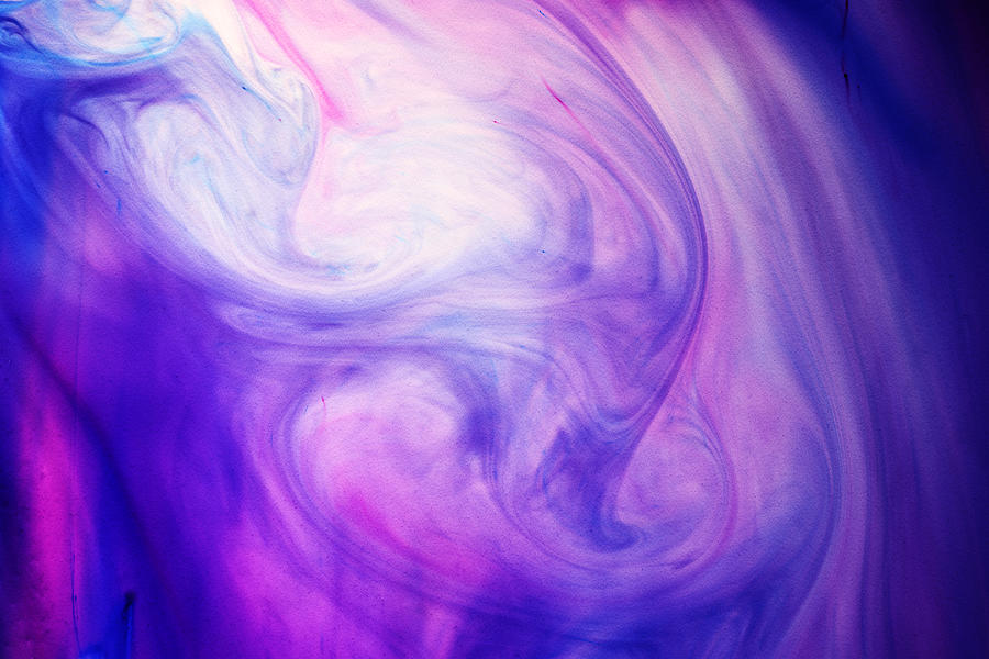 Blue and Purple Dyes Swirling in Liquid Photograph by Mimi  Haddon