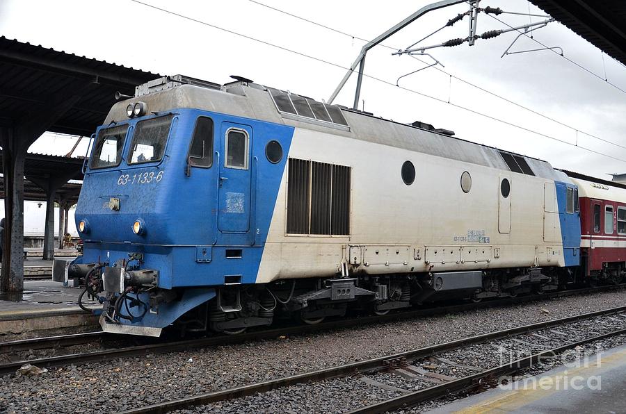 Blue and white railway locomotive Bucharest Romania Photograph by Imran Ahmed