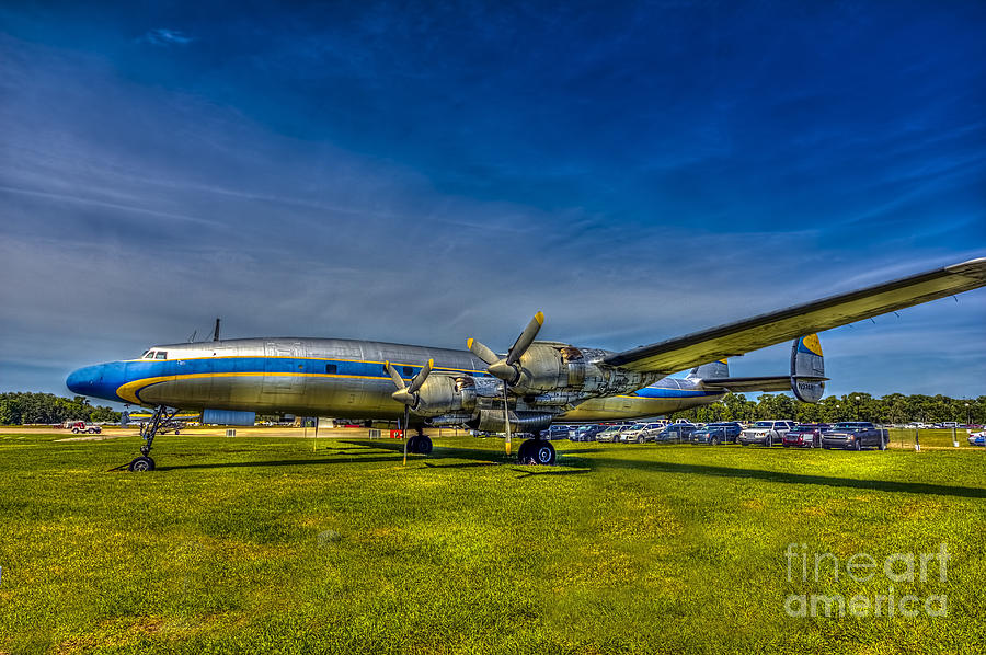 Airplane Photograph - Blue and Yellow Connie by Marvin Spates