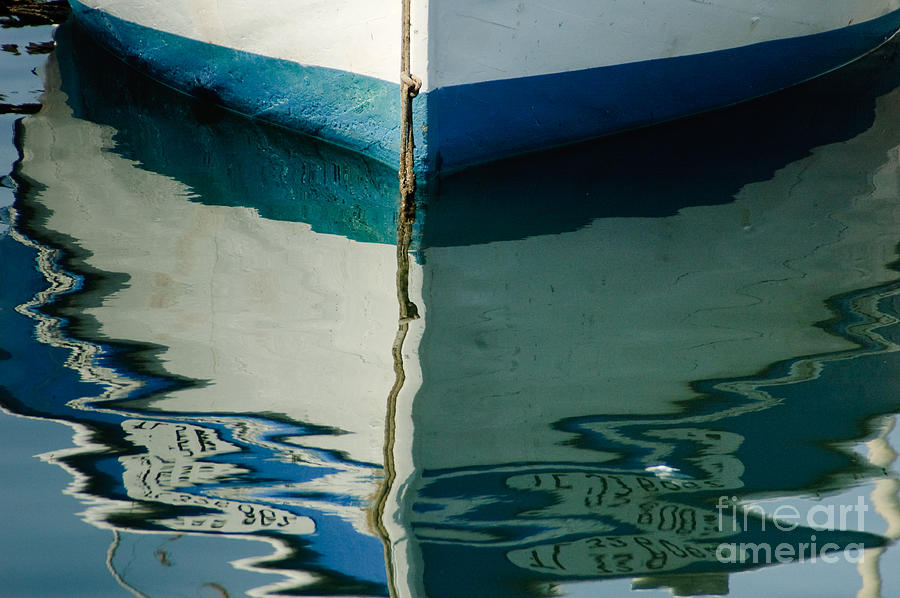 Blue boat hull reflection Photograph by Oscar Gutierrez